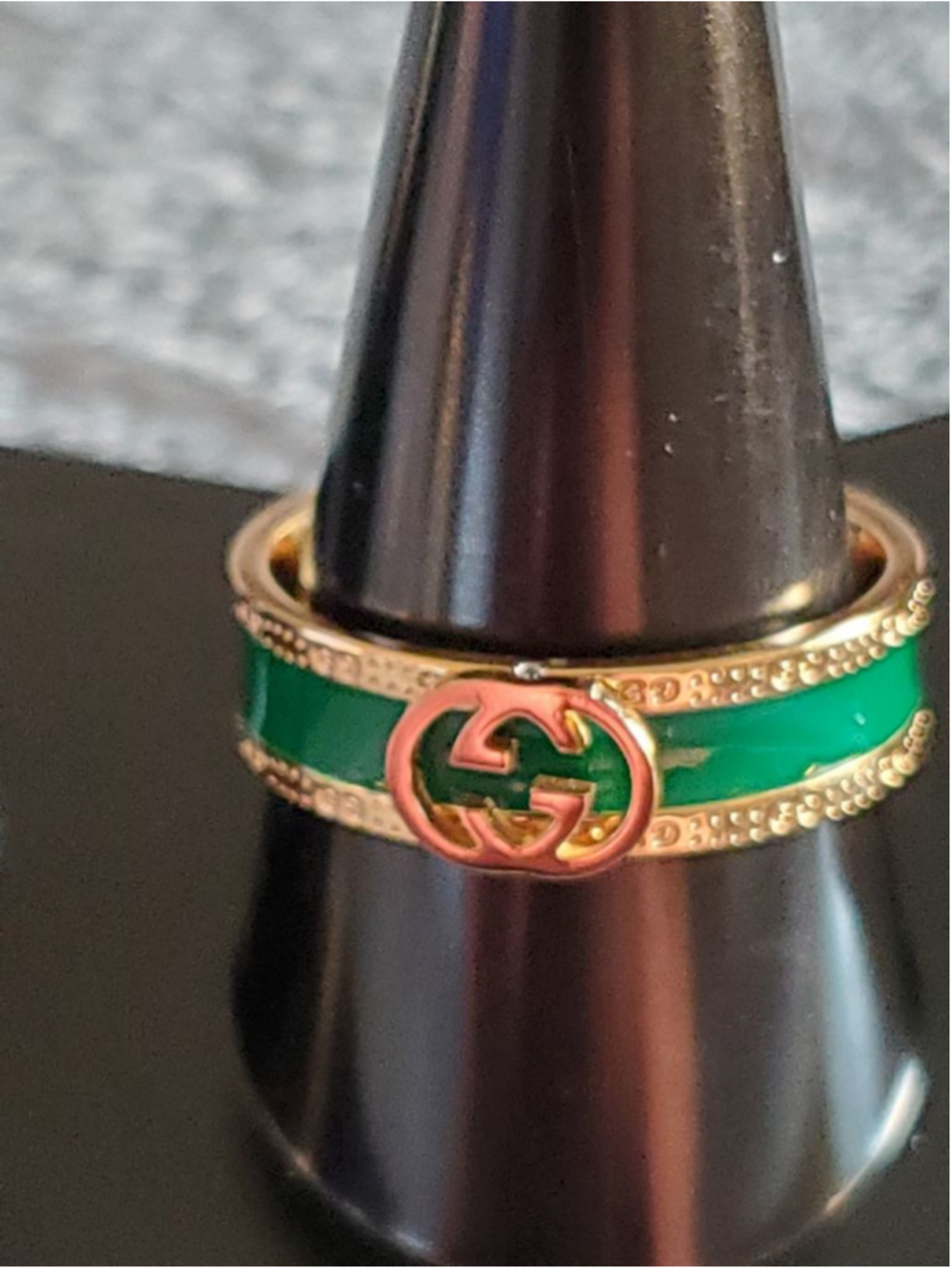 Gold & Green Interlocking Ring. Size 8